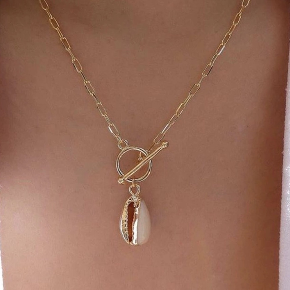 Gold chain cowrie shell necklace